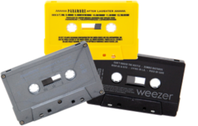 Cassette duplication example image - grey, yellow, and black tape shells